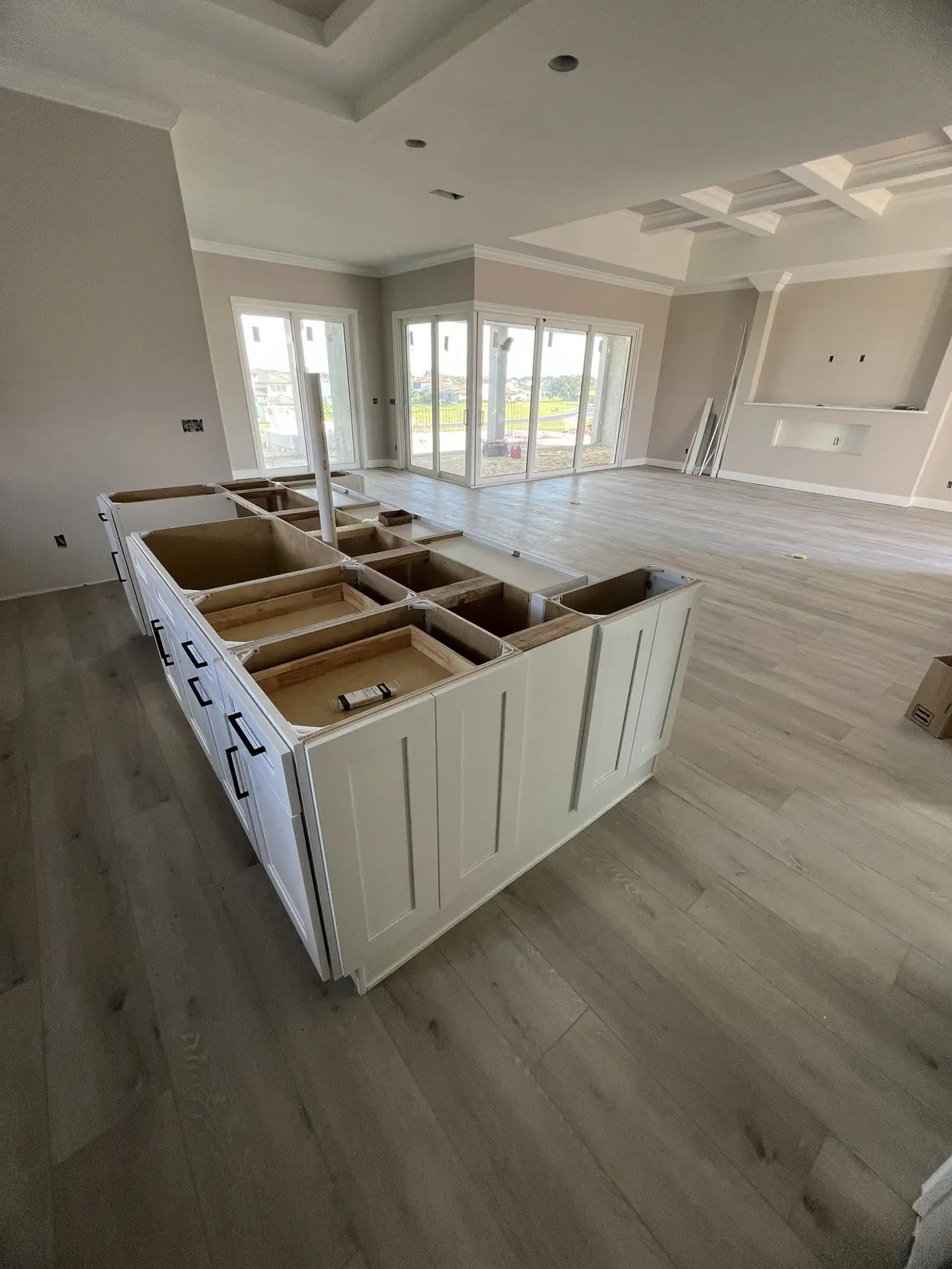 White cabinet run installed and countertop-ready in a Tampa home